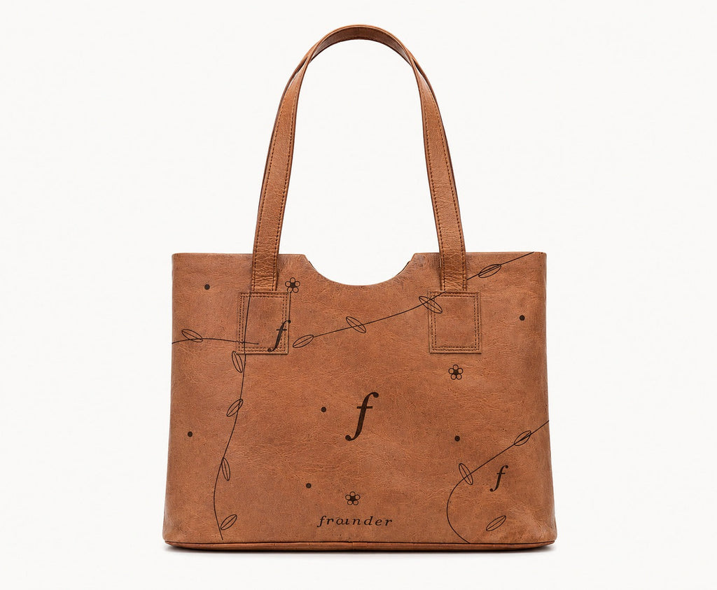 Brown leather tote bag with monogram pattern