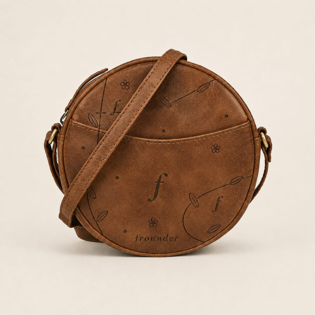 Brown round leather crossbody bag