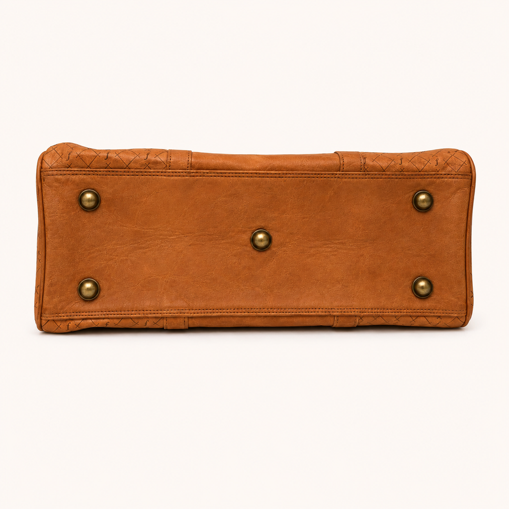 Brown leather bag with brass studs